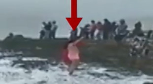 They take a selfie beside the waves.  It ends badly: shocking video