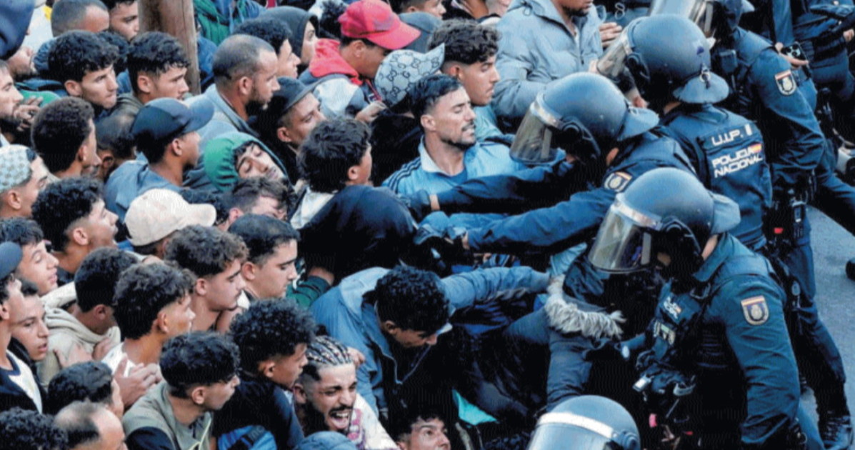 ceuta l assalto dei migranti alla polizia da Liberoquotidiano.it ceuta l assalto dei migranti alla polizia